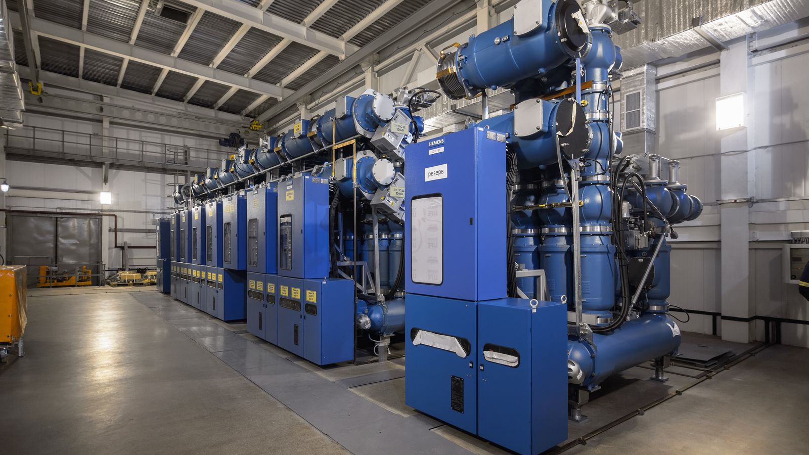 Compressor room and process equipment in a plant.