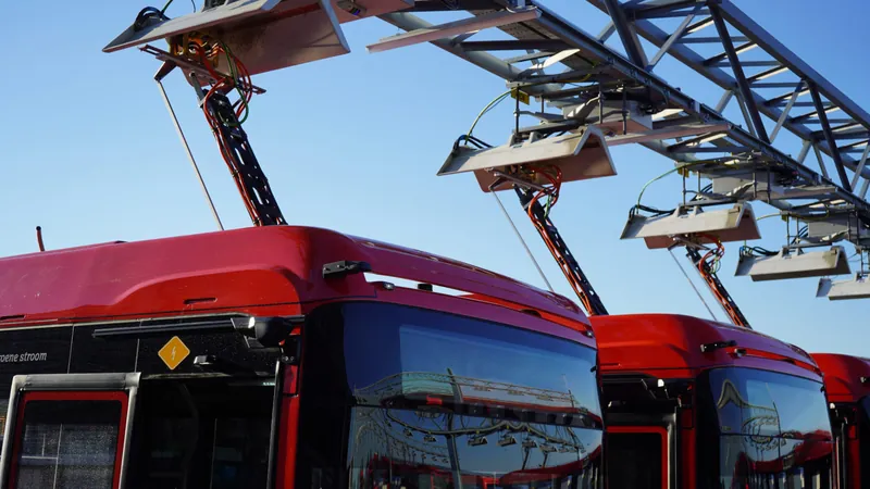 Charging pantograph over an electric bus.